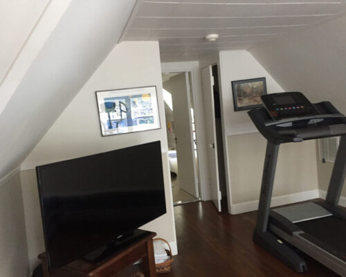 before-photo-of-attic-home-office-with-limited-light-and-height