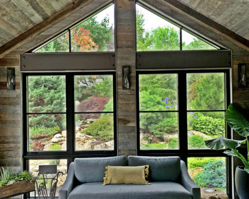 home-addition-transforming-porch-into-living-space-with-industrial-interior